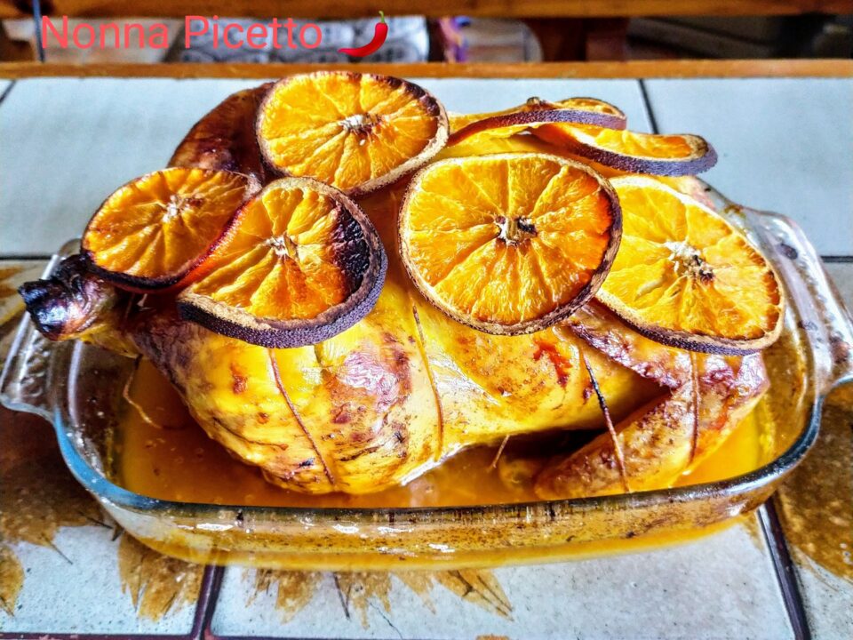 Pollo intero arrosto al forno all'arancia