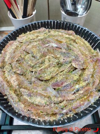 alici in tortiera gratinate al forno ricetta calabrese